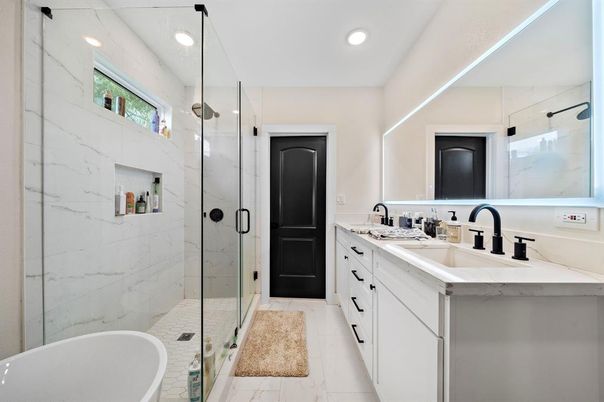 Bathroom, Dual Sink Vanities, Glass Shower, Interior, Marble, Marble Walls, Recessed Lighting