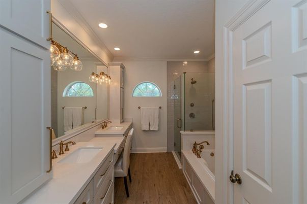 Bathroom, Dual Sink Vanities, Glass Shower, Interior, Recessed Lighting, Wood Texture Flooring