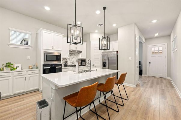 Interior, Kitchen, Pendant Lights, Recessed Lighting, Stainless Steel Appliances, Wood Texture Flooring