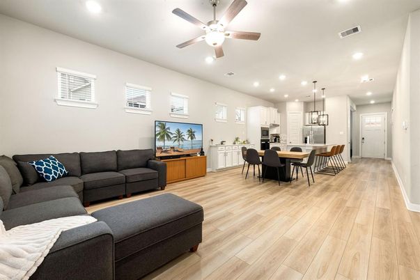 Dining room, Interior, Kitchen, Living room, Pendant Lights, Recessed Lighting, Stainless Steel Appliances, Wood Texture Flooring