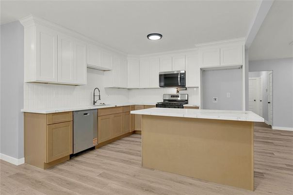 Interior, Kitchen, Recessed Lighting, Stainless Steel Appliances, Wood Texture Flooring