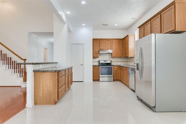 Interior, Kitchen, Recessed Lighting, Stainless Steel Appliances, Wood Texture Flooring