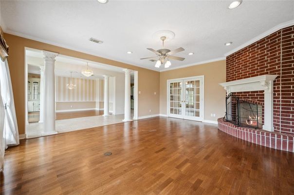 Empty room, Fireplace, Interior, Pendant Lights, Recessed Lighting, Stone Walls, Wood Texture Flooring