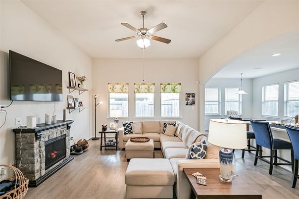 Dining room, Fireplace, Interior, Living room, Pendant Lights, Recessed Lighting, Wood Texture Flooring