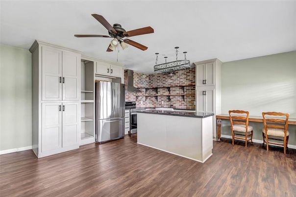 Interior, Kitchen, Stainless Steel Appliances, Stone Walls, Wood Texture Flooring