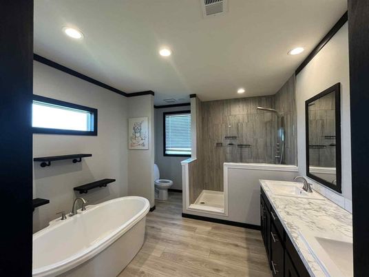 Bathroom, Dual Sink Vanities, Free Standing Baths, Glass Shower, Interior, Recessed Lighting, Wood Texture Flooring