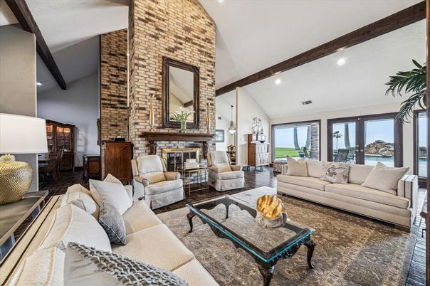 Fireplace, Interior, Living room, Recessed Lighting, Stone Walls, Water, Wooden Beams