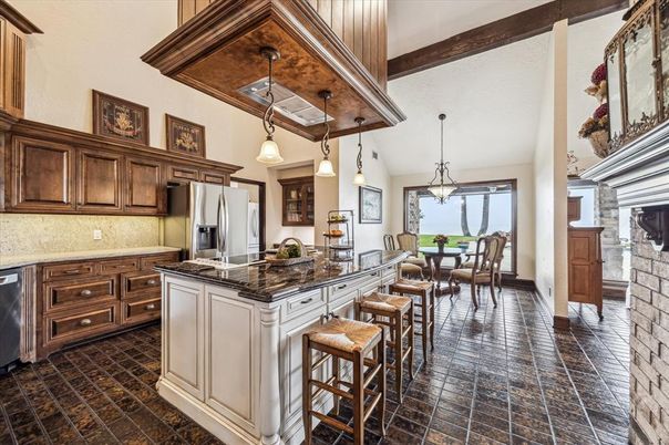 Dining room, Fireplace, Interior, Kitchen, Pendant Lights, Stainless Steel Appliances