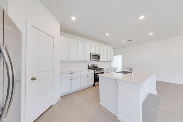 Interior, Kitchen, Recessed Lighting, Stainless Steel Appliances, Wood Texture Flooring