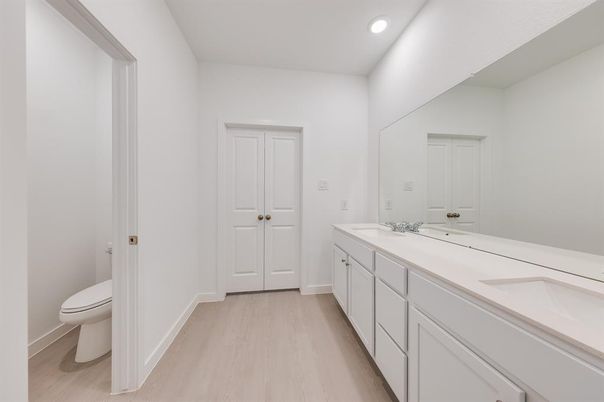 Bathroom, Dual Sink Vanities, Interior, Recessed Lighting, Wood Texture Flooring