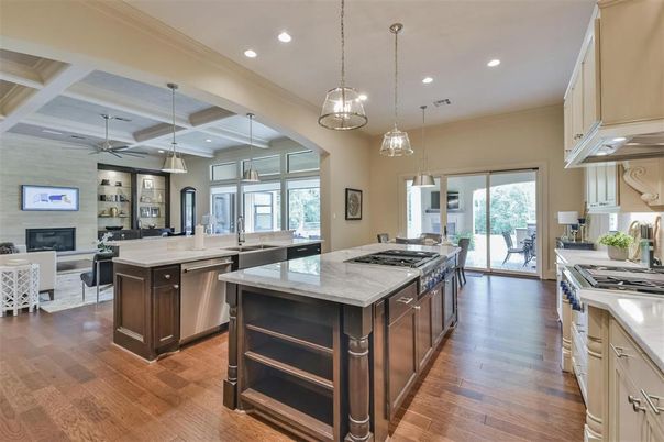 Fireplace, Interior, Kitchen, Living room, Pendant Lights, Recessed Lighting, Stainless Steel Appliances, Wood Texture Flooring