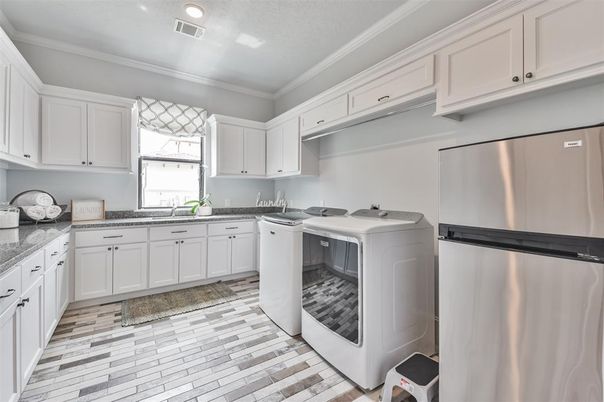 Interior, Kitchen, Recessed Lighting, Stainless Steel Appliances, Washer, Wood Texture Flooring