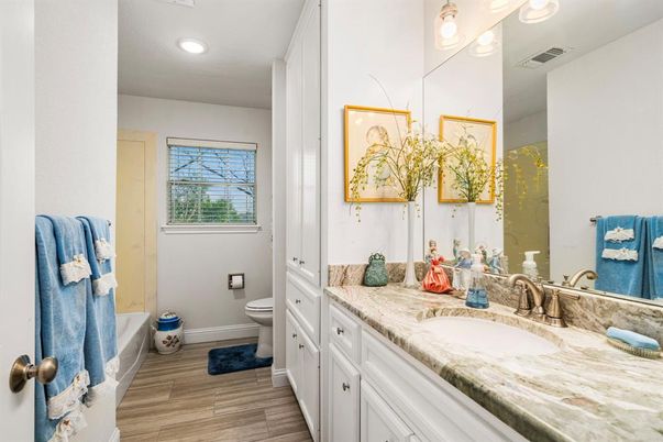 Bathroom, Dual Sink Vanities, Interior, Recessed Lighting, Wood Texture Flooring