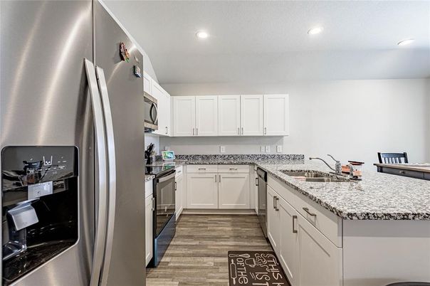 Interior, Kitchen, Recessed Lighting, Stainless Steel Appliances, Wood Texture Flooring