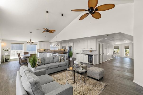 Chandelier, Dining room, Interior, Kitchen, Living room, Pendant Lights, Recessed Lighting, Stainless Steel Appliances, Wood Texture Flooring