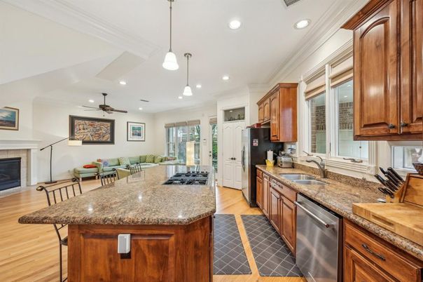 Fireplace, Interior, Kitchen, Pendant Lights, Recessed Lighting, Stainless Steel Appliances, Wood Texture Flooring
