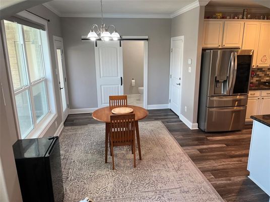 Dining room, Interior, Kitchen, Pendant Lights, Stainless Steel Appliances, Wood Texture Flooring
