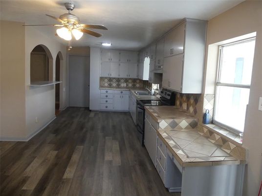 Interior, Kitchen, Tile Countertops, Wood Texture Flooring