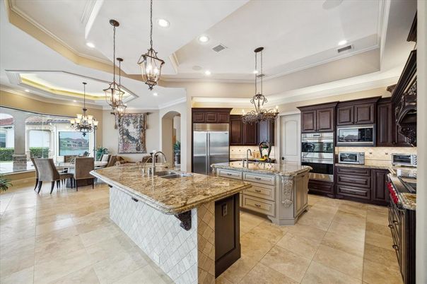 Chandelier, Dining room, Interior, Kitchen, Pendant Lights, Recessed Lighting, Stainless Steel Appliances