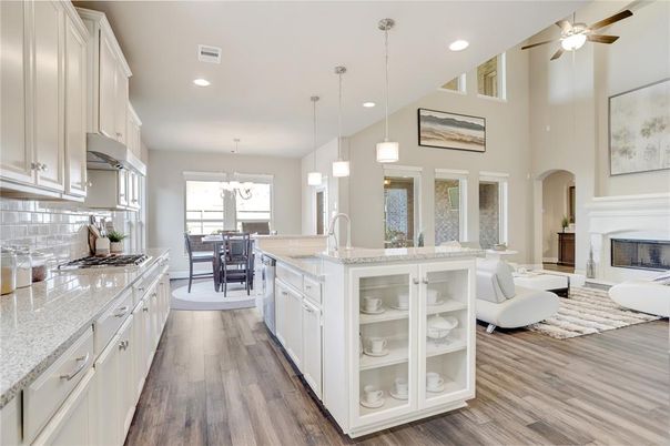 Chandelier, Dining room, Fireplace, Interior, Kitchen, Living room, Pendant Lights, Recessed Lighting, Wood Texture Flooring