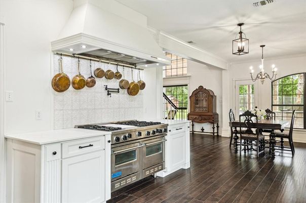 Chandelier, Dining room, Interior, Kitchen, Pendant Lights, Recessed Lighting, Stainless Steel Appliances, Wood Texture Flooring