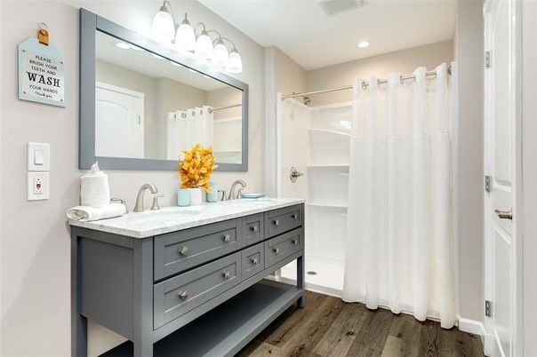 Bathroom, Dual Sink Vanities, Interior, Recessed Lighting, Walk-in Closets, Wood Texture Flooring