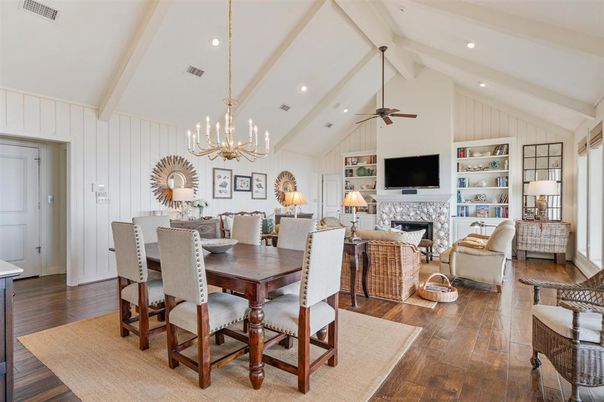 Chandelier, Dining room, Fireplace, Interior, Living room, Pendant Lights, Recessed Lighting, Wood Texture Flooring