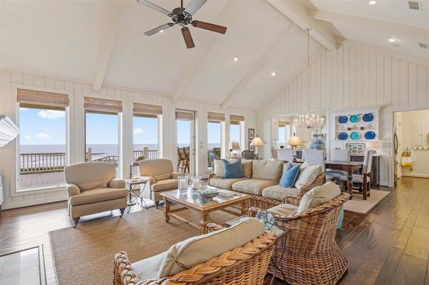Chandelier, Dining room, Fireplace, Interior, Living room, Recessed Lighting, Water, Wood Texture Flooring