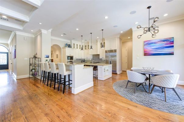 Dining room, Interior, Kitchen, Pendant Lights, Recessed Lighting, Stainless Steel Appliances, Wood Texture Flooring