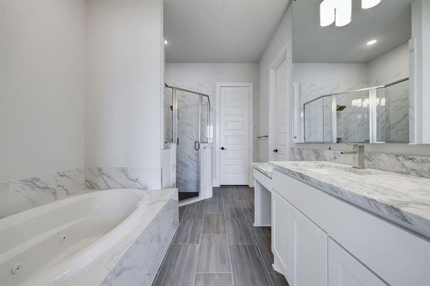 Bathroom, Dual Sink Vanities, Glass Shower, Interior, Marble, Marble Walls, Recessed Lighting
