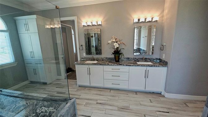 Bathroom, Dual Sink Vanities, Glass Shower, Interior, Wood Texture Flooring