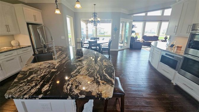 Chandelier, Dining room, Interior, Kitchen, Living room, Pendant Lights, Wood Texture Flooring