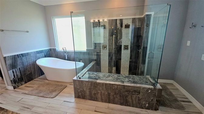 Bathroom, Free Standing Baths, Glass Shower, Interior, Recessed Lighting, Wood Texture Flooring