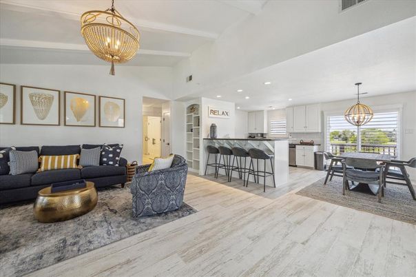 Chandelier, Dining room, Interior, Kitchen, Living room, Pendant Lights, Recessed Lighting, Wood Texture Flooring