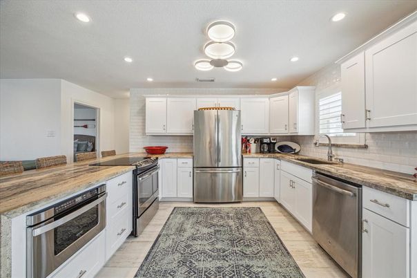 Interior, Kitchen, Recessed Lighting, Stainless Steel Appliances, Wood Texture Flooring