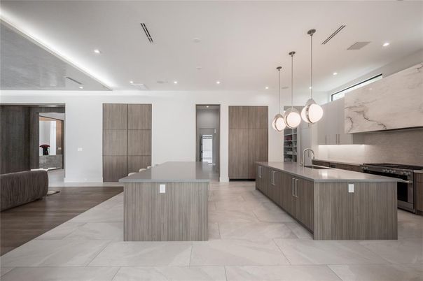 Interior, Kitchen, Marble Walls, Pendant Lights, Recessed Lighting, Stainless Steel Appliances, Wood Texture Flooring