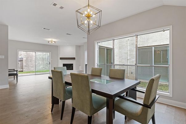 Dining room, Fireplace, Interior, Pendant Lights, Wood Texture Flooring