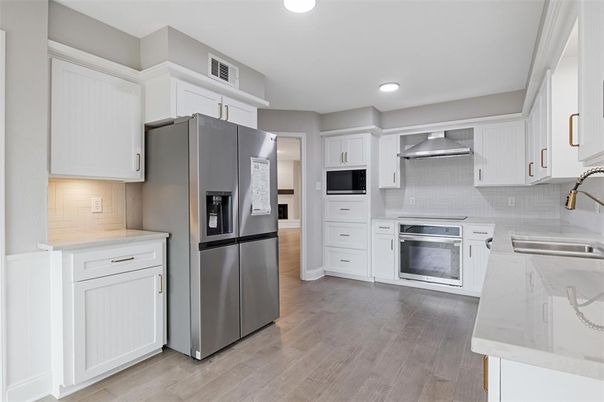 Interior, Kitchen, Recessed Lighting, Stainless Steel Appliances, Wood Texture Flooring