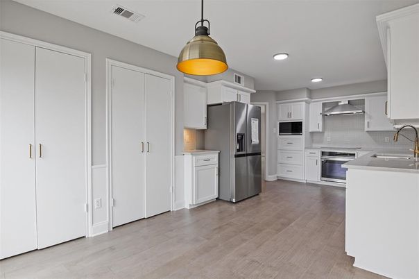 Interior, Kitchen, Pendant Lights, Recessed Lighting, Stainless Steel Appliances, Wood Texture Flooring