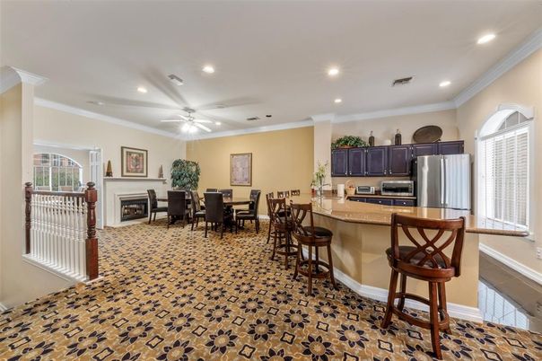 Dining room, Fireplace, Interior, Kitchen, Recessed Lighting, Stainless Steel Appliances