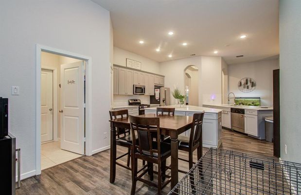 Dining room, Interior, Kitchen, Recessed Lighting, Stainless Steel Appliances, Wood Texture Flooring