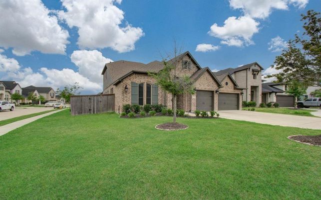 Attached, Backyard, Exterior, Facade, Brick Facade, Tudor Revival