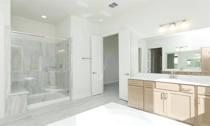 Bathroom, Dual Sink Vanities, Glass Shower, Interior, Recessed Lighting, Wood Texture Flooring