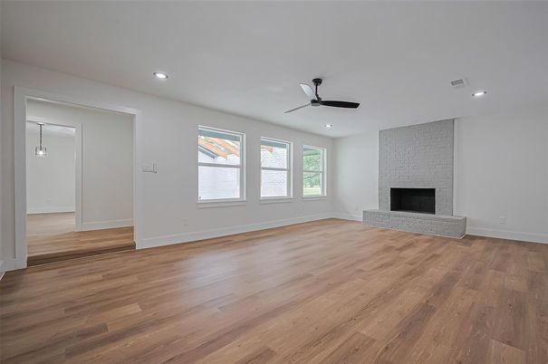 Empty room, Fireplace, Interior, Pendant Lights, Recessed Lighting, Wood Texture Flooring