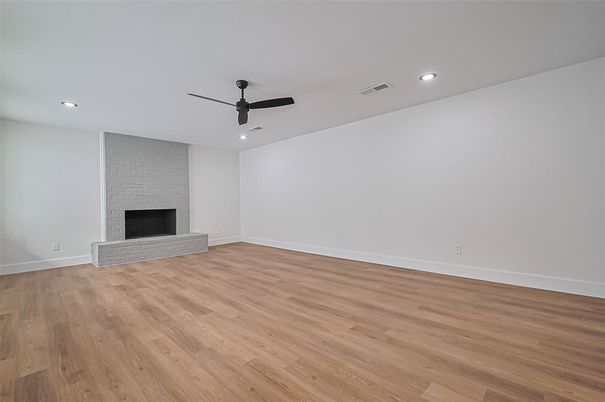 Empty room, Fireplace, Interior, Recessed Lighting, Wood Texture Flooring