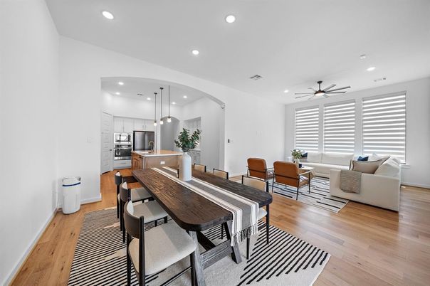 Dining room, Interior, Kitchen, Living room, Pendant Lights, Recessed Lighting, Stainless Steel Appliances, Wood Texture Flooring