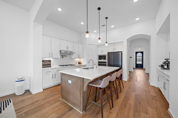 Interior, Kitchen, Pendant Lights, Recessed Lighting, Stainless Steel Appliances, Wood Texture Flooring