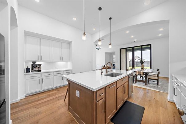Dining room, Interior, Kitchen, Pendant Lights, Recessed Lighting, Stainless Steel Appliances, Wood Texture Flooring
