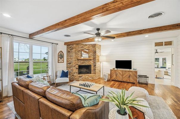 Fireplace, Interior, Living room, Recessed Lighting, Stone Walls, Wooden Beams, Wood Texture Flooring