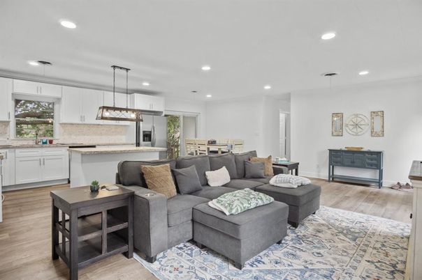 Dining room, Interior, Kitchen, Living room, Pendant Lights, Recessed Lighting, Stainless Steel Appliances, Wood Texture Flooring